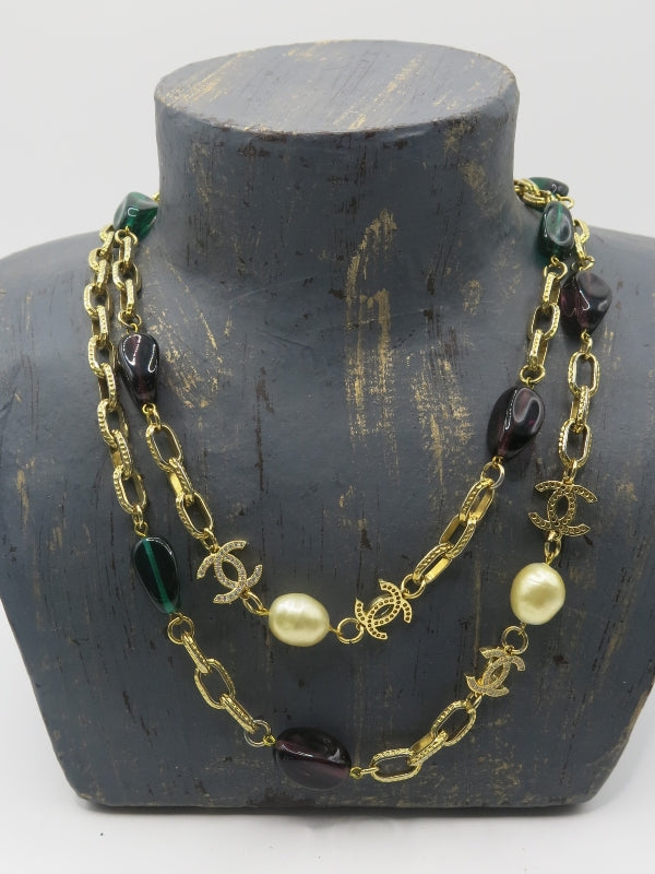 Chanel cc charm necklace with green and purple poured glass beads