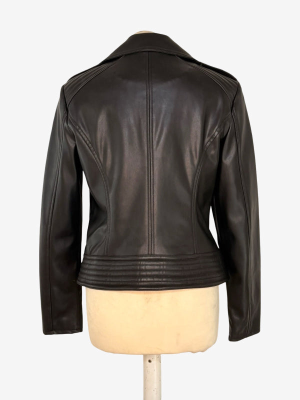 A black leather jacket shown from the back, displayed on a cream-colored dress form mannequin against a plain white background.