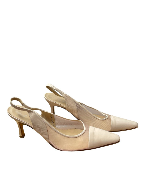 A pair of pointed-toe slingback pumps in a light beige/champagne satin and leather mix, featuring a gold-tone heel, shown against a plain white background.