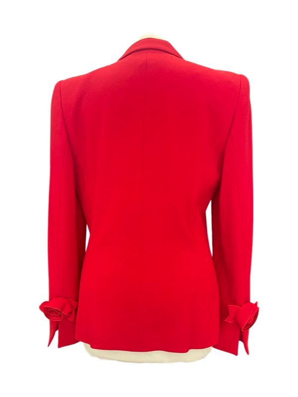 Red ladies fitted jacket back with flower rosettes on cuff