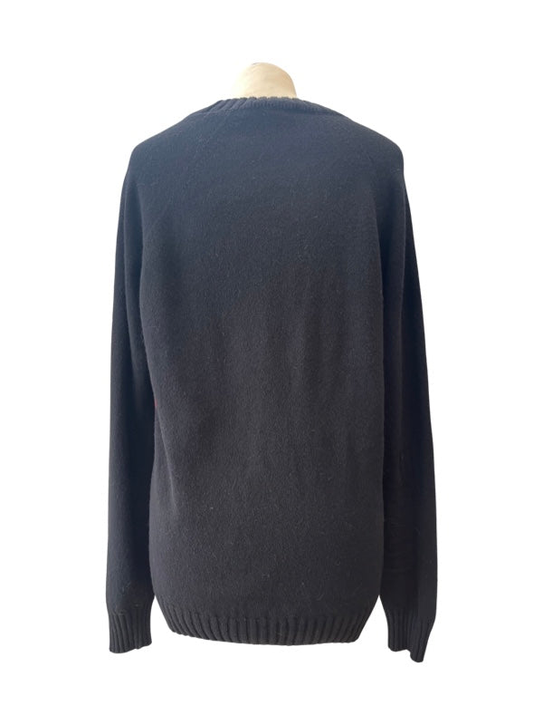 Back of black round neck wool jumper