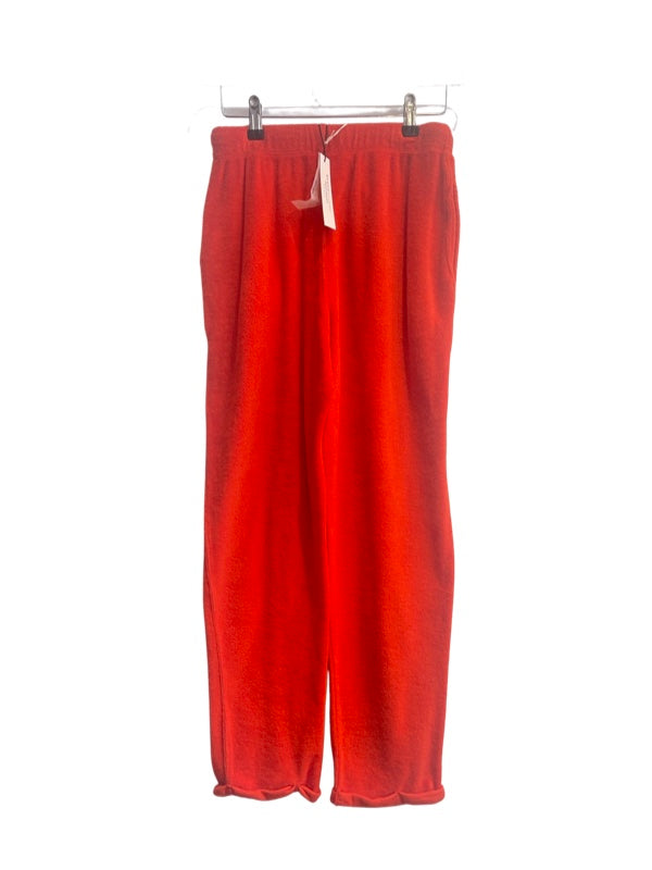 Back of red towelling sweatpants with tags