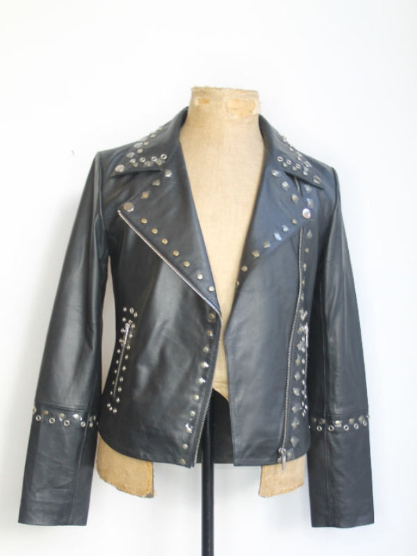 A black studded leather jacket on a mannequin, displaying the front view with the collar and stud detailing.