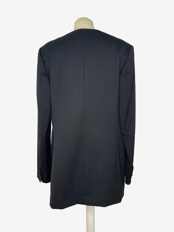 A black longline blazer shown from the back on a dress form mannequin against a plain white background.