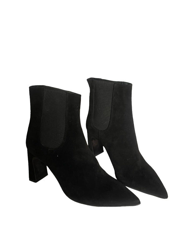 A pair of black suede ankle boots with pointed toes, block heels, and elastic side panels, shown on a plain white background.