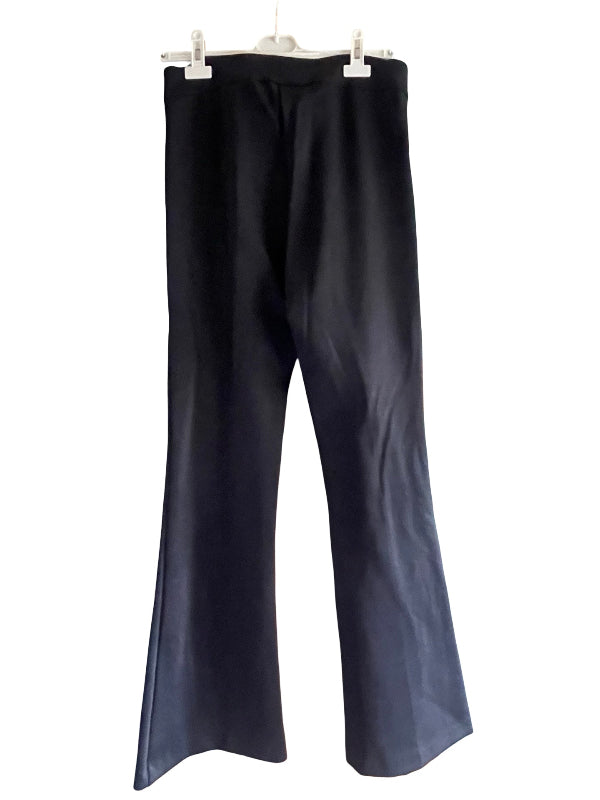 Black wide-leg pants hanging from a white plastic hanger against a plain white background.