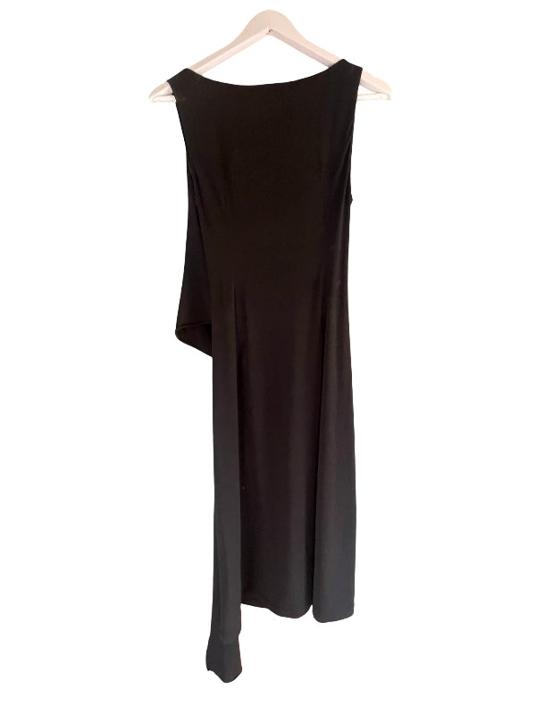 A sleeveless black dress with a draped hemline, hanging on a white wooden hanger against a plain white background.