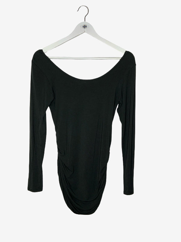 A dark green long-sleeve top with a wide scoop neckline, hanging on a white plastic hanger against a light gray background.