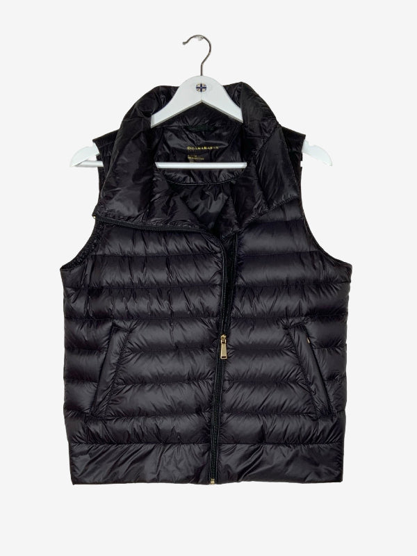 A black puffer vest with horizontal quilting, a full front zipper, and zippered side pockets, hanging on a white hanger against a light gray background.