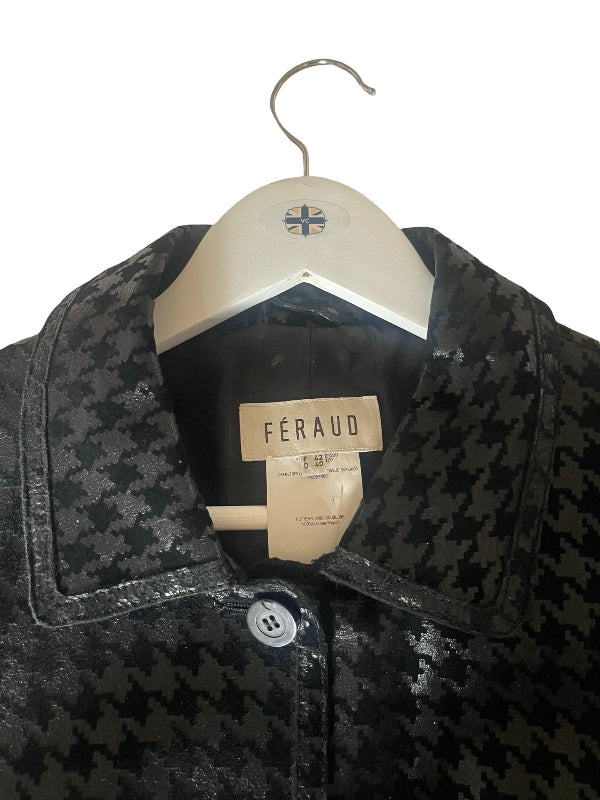 A close-up of a black and black tone houndstooth patterned jacket hanging on a white hanger with the FÉRAUD brand label visible.