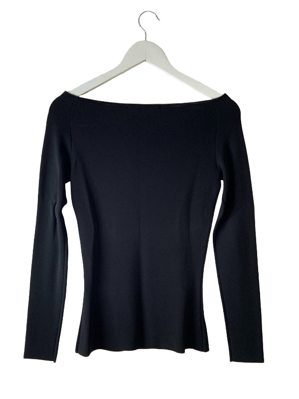 A black long-sleeve wide neck top hanging on a white wooden hanger against a plain white background