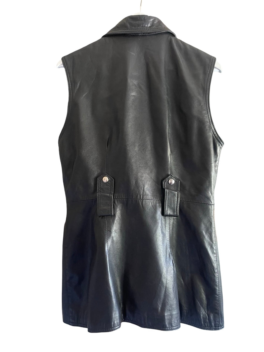Black leather sleeveless vest shown from the back, featuring a collar, two rear strap details with silver-tone snaps, and a straight silhouette, displayed on a white hanger against a white background.