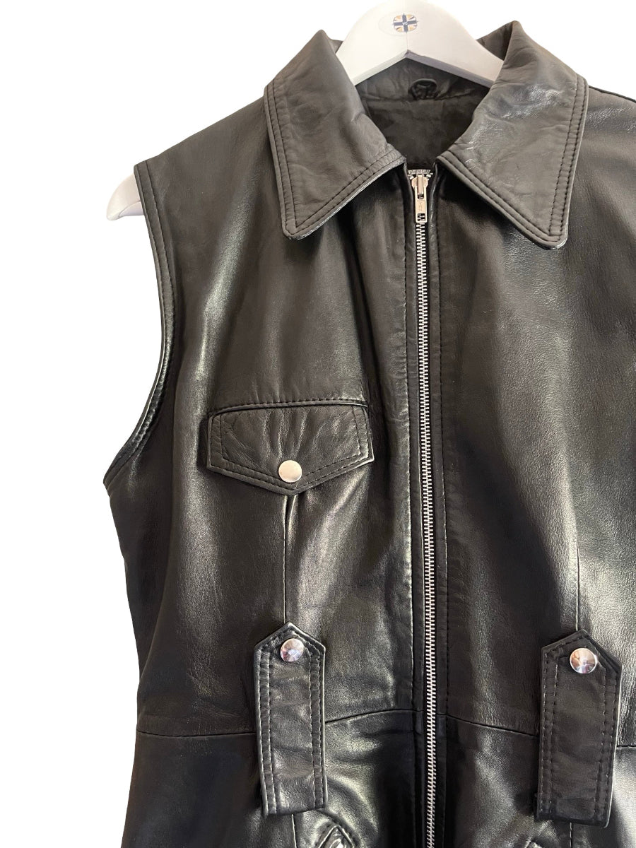Black leather vest with a front zipper, collar, and flap pockets, shown on a white hanger against a white background.