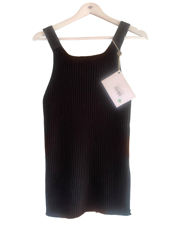 A black ribbed knit sleeveless tank top hanging on a white plastic hanger with a white product tag attached, set against a plain white background.