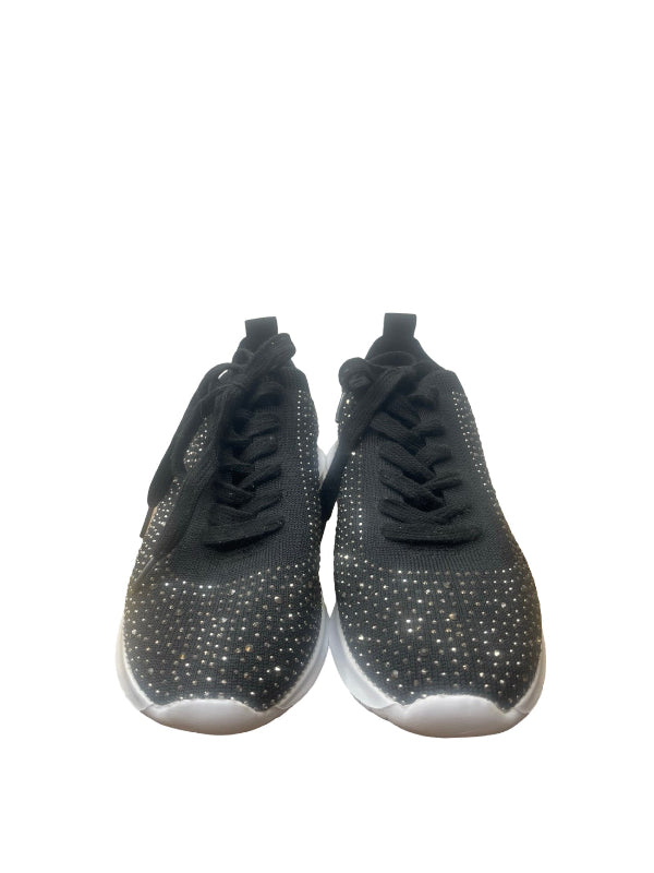 A pair of black knit athletic sneakers with silver rhinestone embellishments on the toe boxes, black laces, and white soles, shown against a plain white background.