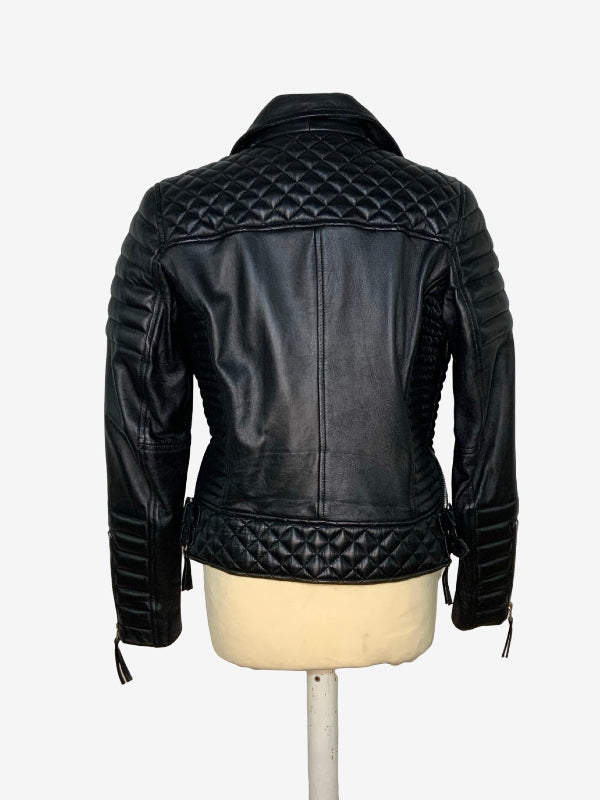 Black leather jacket with quilted diamond-patterned back panels and sleeves, displayed on a cream dress form against a light gray background.