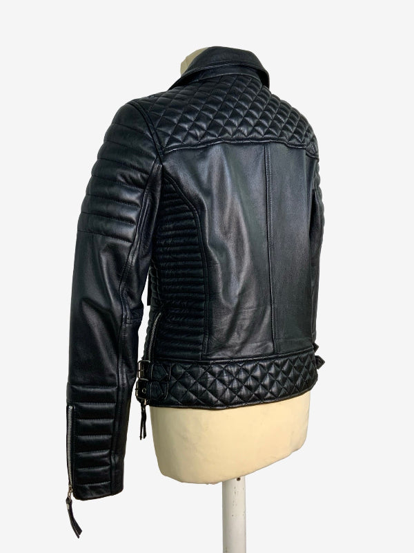 Black leather motorcycle jacket with quilted diamond-stitching on the back and shoulders, displayed on a cream mannequin torso against a light gray background.