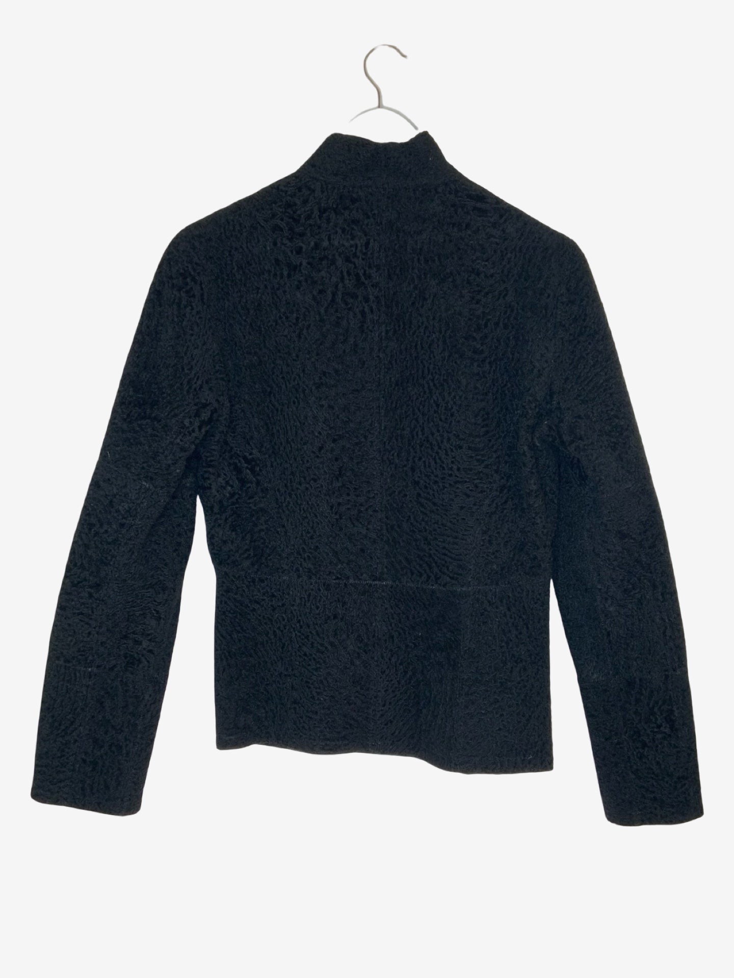A black textured sherpa shearling fleece jacket with a mock neck, displayed on a metal hanger against a plain white background.