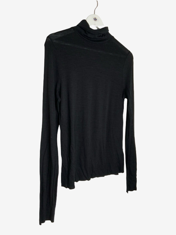 A black long-sleeve turtleneck top hanging on a white hanger against a plain white background.