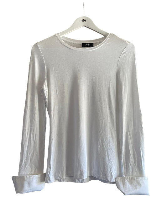 A white long-sleeve crewneck top hanging on a white wooden hanger against a plain white background.