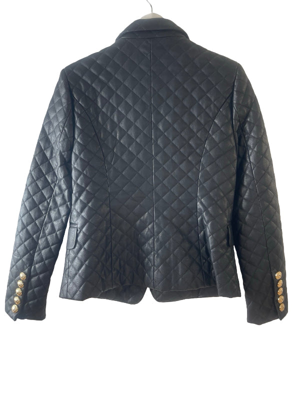 Black quilted faux leather jacket shown from the back, featuring a diamond-quilted pattern and decorative gold buttons on the cuffs, displayed on a hanger against a white background.