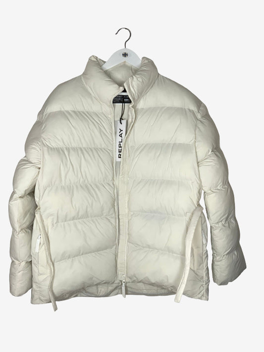 An off-white puffer jacket with horizontal quilting, hanging on a white hanger against a light gray background. The brand name 'MINKY' is vertically printed on the zipper pull.