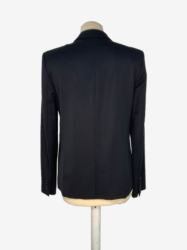 A black ladies tuxedo suit jacket displayed on a mannequin torso, showing the back view against a plain white background.