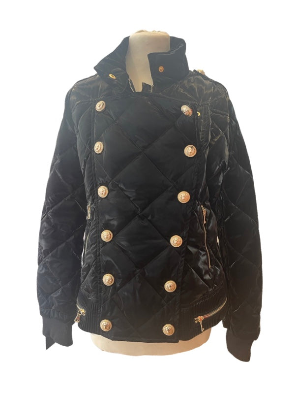 Padded quilted ladies jacket black with bold gold buttons and zips