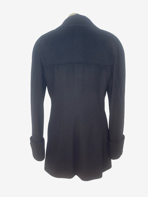 A black long-sleeve jacket shown from the back on a mannequin, against a plain white background