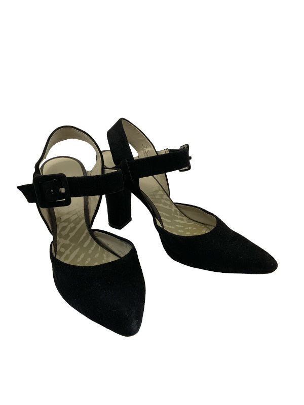 A pair of black pointed-toe slingback pumps with ankle straps and buckle details, shown against a plain white background.