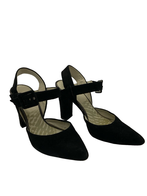 A pair of black pointed-toe Mary jane pumps with block heels and ankle straps, shown on a plain white background.