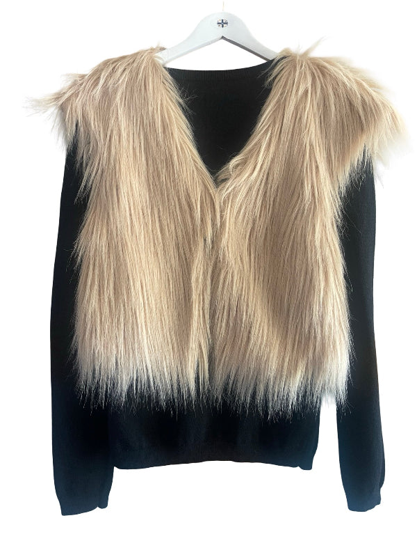 A black knit sweater vest layered with a large beige faux fur collar, displayed on a white hanger against a white background.