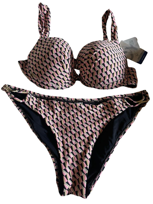 A two-piece bikini set with a geometric pattern in pink, beige, and black, featuring a plunge bra top with tie straps and matching high-cut bikini bottoms with black and gold detail