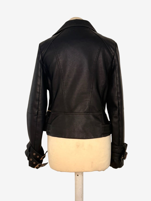 A black leather jacket shown from the back on a cream-colored dress form mannequin, set against a plain white background.