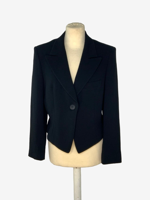 A black women's blazer jacket displayed on a cream-colored mannequin torso against a plain white background.
