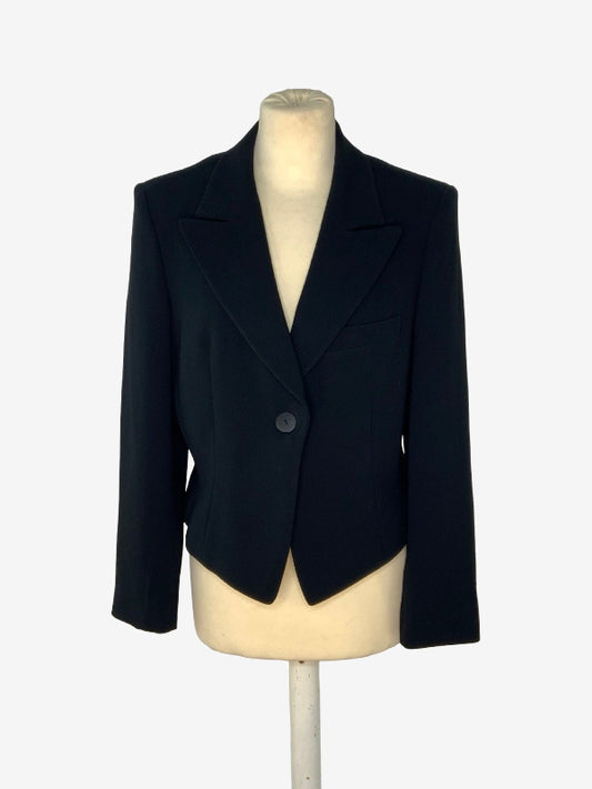 A black women's blazer jacket displayed on a cream-colored mannequin torso against a plain white background.