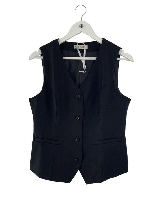 A black sleeveless vest with a V-neck, four-button front, and two front flap pockets, hanging on a white hanger against a plain white background.