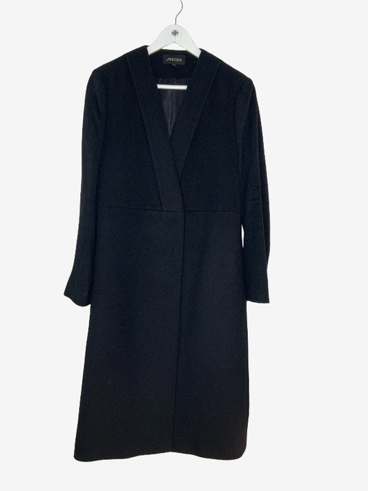 A black long-line wrap coat with a shawl collar, hanging on a white hanger against a plain light gray background.