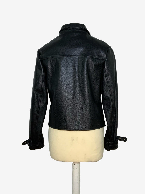 A black faux leather jacket shown from the back on a cream-colored dress form mannequin, set against a plain white background.