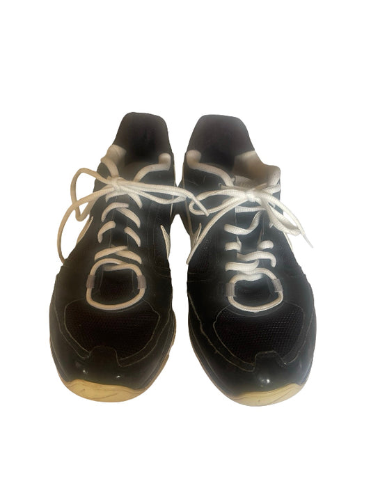 A pair of black athletic sneakers with white laces and light beige soles, shown from a top-down view on a white background.