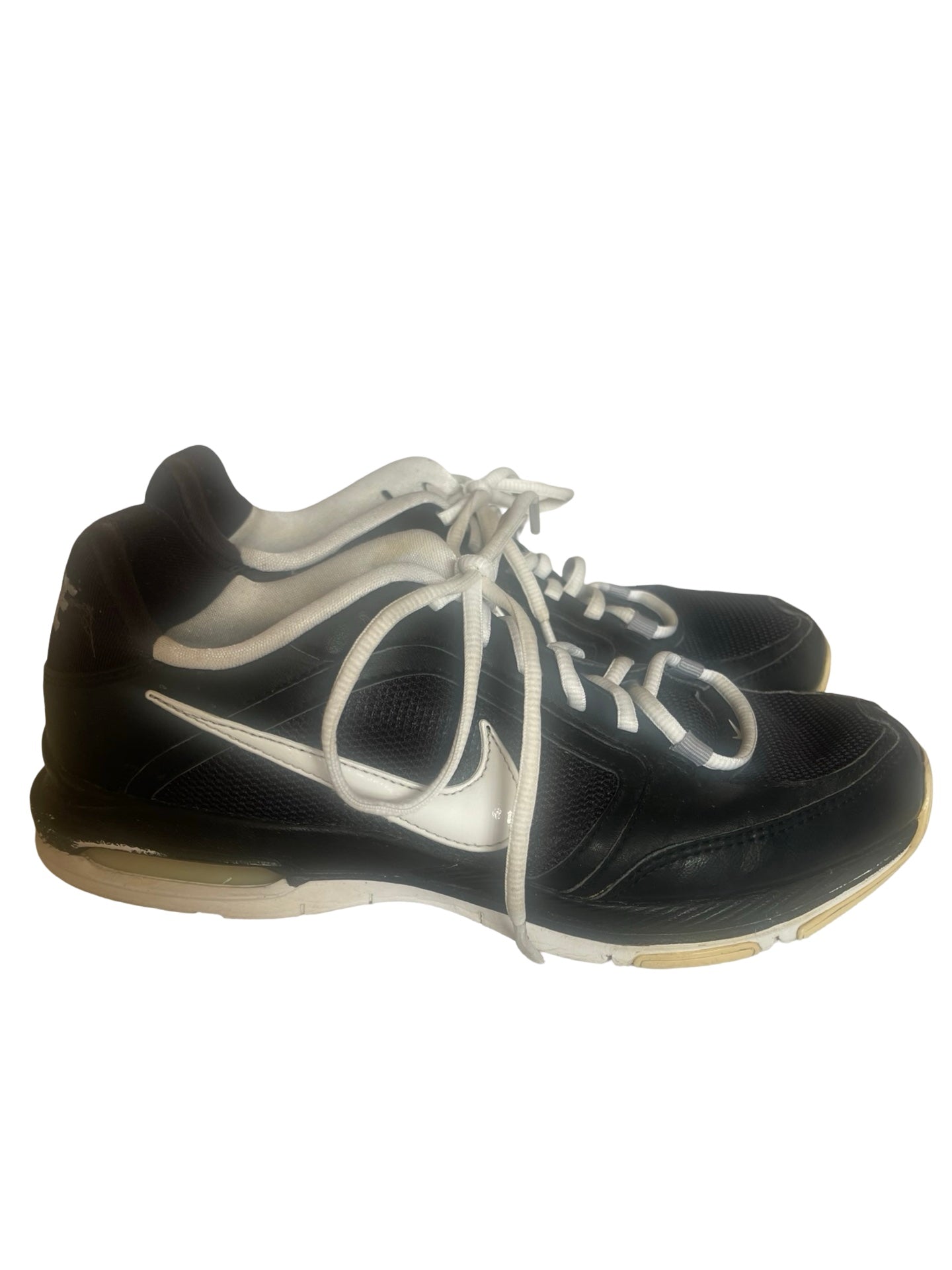 A pair of black Nike athletic sneakers with white laces and a white Swoosh logo, shown against a plain white background.