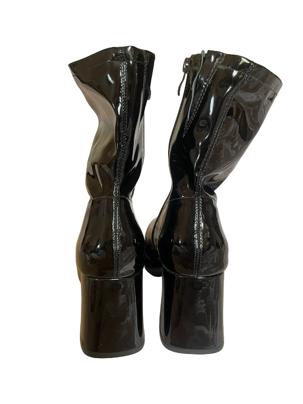 A pair of black patent leather ankle boots with a block heel and side zipper, shown from the back against a white background.