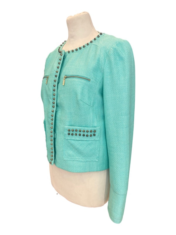 Cropped jacket green side view with stud detail on pockets