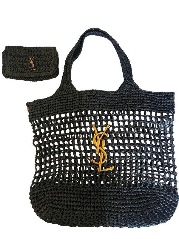 Black crochet mesh tote bag with a gold-tone logo clasp, shown with a matching black crocheted wristlet pouch on a white background.
