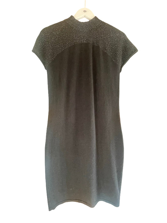 A short-sleeve knit dress in dark gray with a textured, sparkly yoke across the shoulders, hanging on a white wooden hanger against a plain white background.
