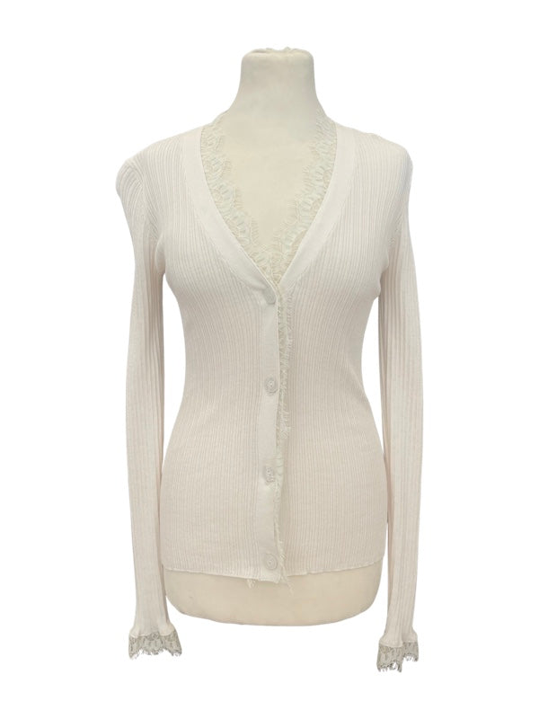 Off white cardigan front with lace trim and three pearl buttons