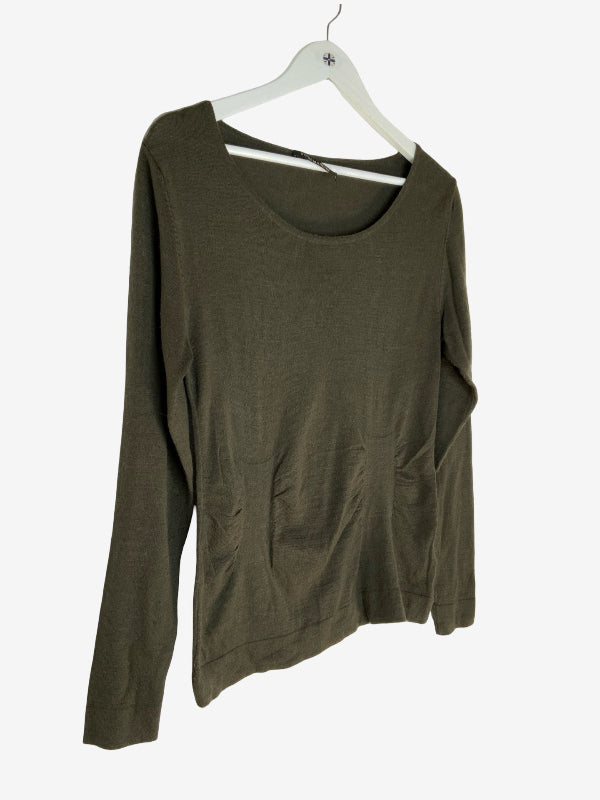 An olive green long-sleeve knit top hanging on a white plastic hanger against a plain white background.