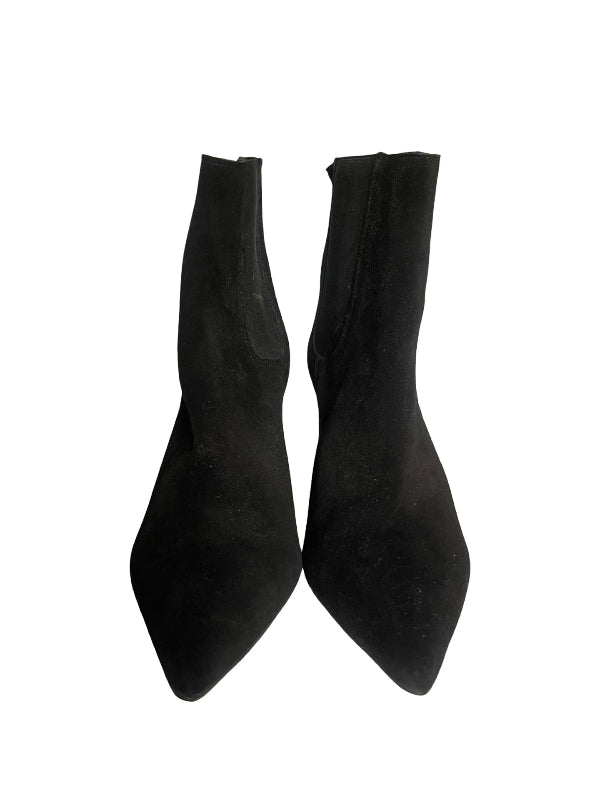 A pair of black pointed-toe ankle boots with a fuzzy suede-like texture, shown from the back against a plain white background.