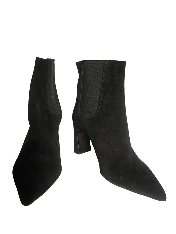 A pair of black pointed-toe ankle boots with a block heel and elastic side panels, shown against a plain white background.