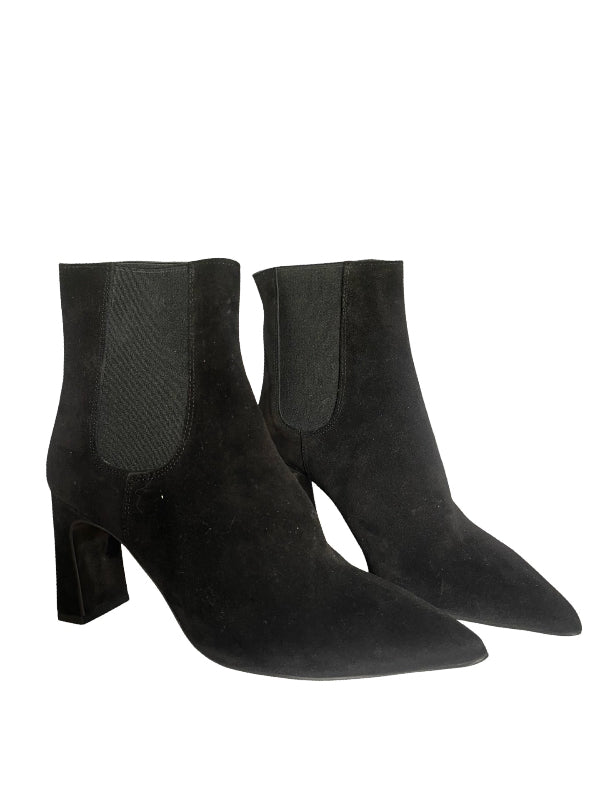 A pair of black suede ankle boots with pointed toes and block heels, shown against a plain white background.
